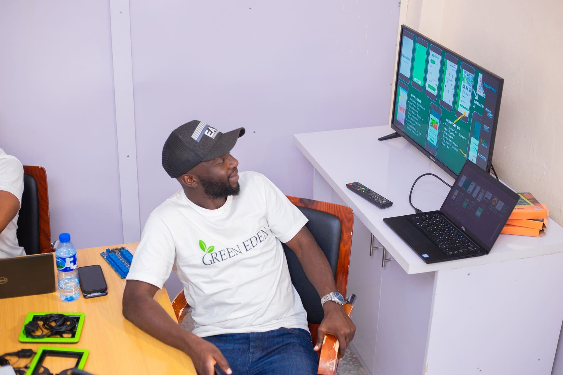 Farmer monitoring crops with a tablet in the field